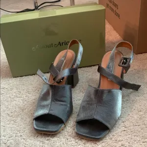 About Arianne Women's Gray Slingback Heels