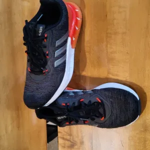Adidas Kaptir Super Trail running shoes black orange white and gray size 9