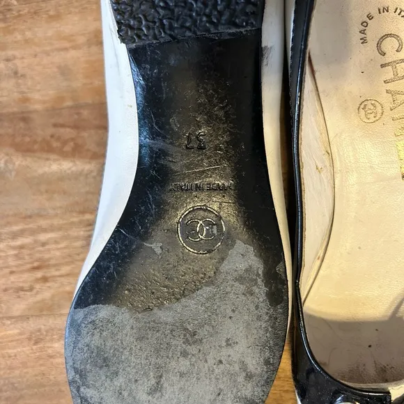 CHANEL black patent and white leather spectator flats.Size 37 (6.5).