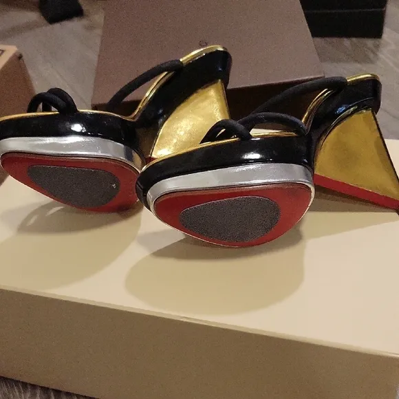 Christian Louboutin Elegant Black and Gold Wedge Heels