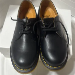 Dr. Martens Air Wair Black Leather Shoes. Preowned in excellent condition.