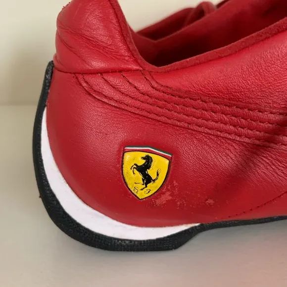Hold Vintage Puma Ferrari racing shoes