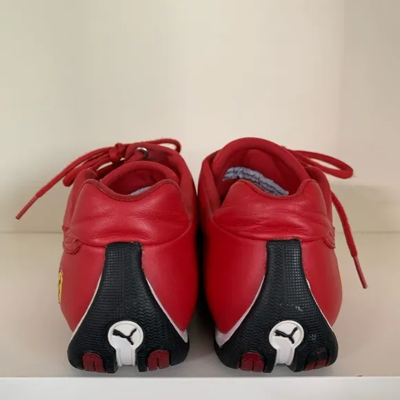 Hold Vintage Puma Ferrari racing shoes