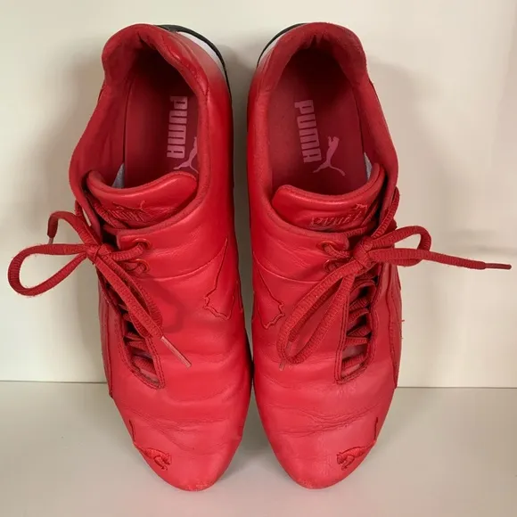 Hold Vintage Puma Ferrari racing shoes