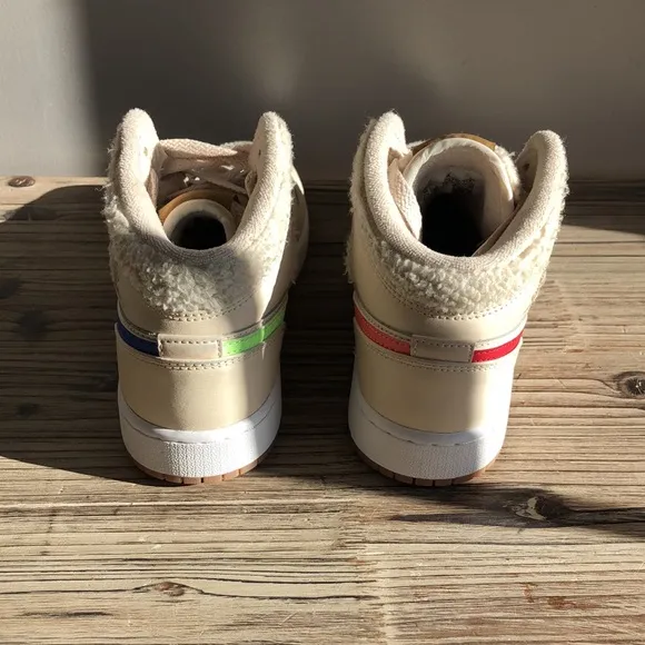 Kids Jordan’s 4.5Y they are beige with all check marks different colors.
