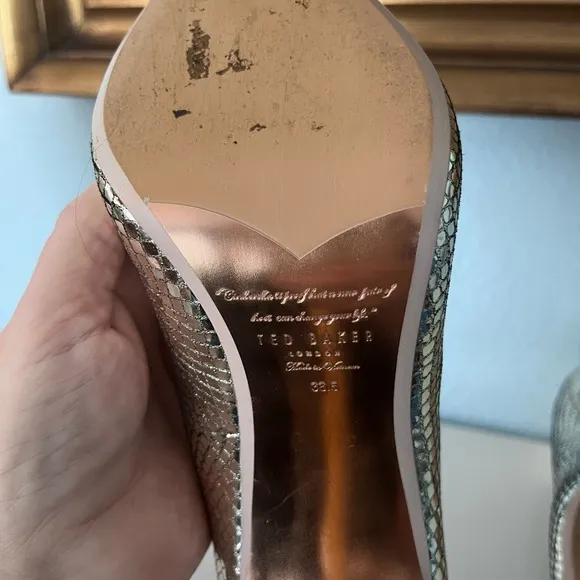 Like New Ted Baker Elegant Gold metallic Leather Heels with large rhinestones.