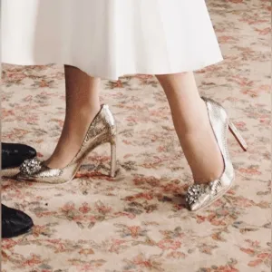 Like New Ted Baker Elegant Gold metallic Leather Heels with large rhinestones.