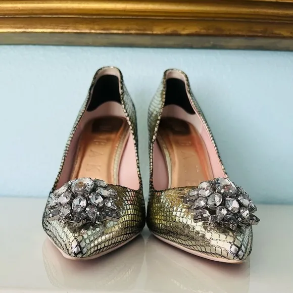 Like New Ted Baker Elegant Gold metallic Leather Heels with large rhinestones.