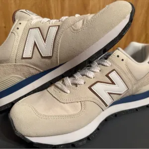 New in box, New Balance Men's Cream Sneakers size 9.5M/11W