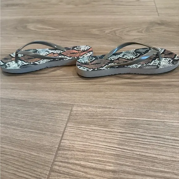Tory Burch- snakeskin flip flop sandals
